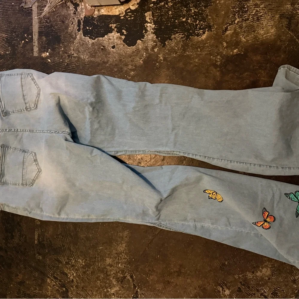Fashion Nova Light Wash Flare Jeans with Colorful Butterfly Embroidery - Picture 2 of 2